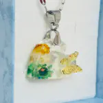 Colgante Corazón Transparente con Mariposa Dorada